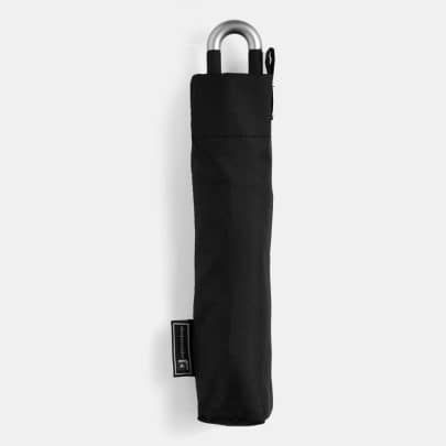 Kompakt sort taskeparaply